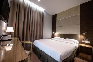 Postel nebo postele na pokoji v ubytování Hotel Meliden