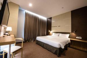 Postel nebo postele na pokoji v ubytování Hotel Meliden