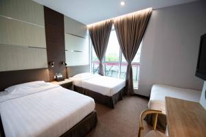 Postel nebo postele na pokoji v ubytování Hotel Meliden