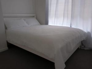 Posteľ alebo postele v izbe v ubytovaní Spacious family home