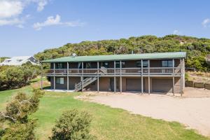 an aerial view of a house on the beach at Dundas on the Beach at St Andrews in Saint Andrews Beach