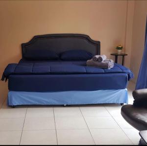 Postel nebo postele na pokoji v ubytování Maxim Apartment