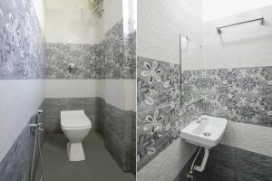 a bathroom with a toilet and a sink at FabExpress Shivas Inn in Nagpur