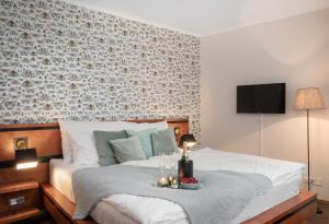 Postel nebo postele na pokoji v ubytování 4 Elements Apartments