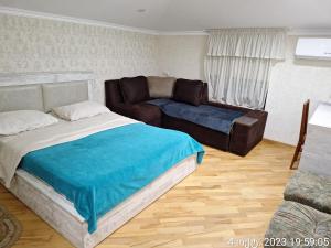 Postel nebo postele na pokoji v ubytování GUEST HOUSE 15A