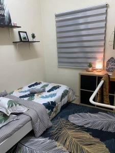 Postel nebo postele na pokoji v ubytování Tulip Hijau Homestay - Bukit Beruntung - 4Bedrooms
