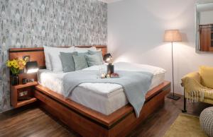 Postel nebo postele na pokoji v ubytování 4 Elements Apartments