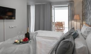 Postel nebo postele na pokoji v ubytování 4 Elements Apartments