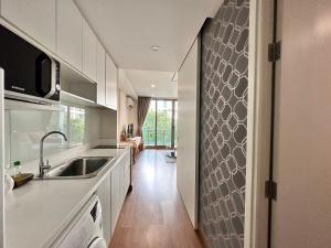 Η κουζίνα ή μικρή κουζίνα στο 1Bedroom+Sofa bed, Luxury Condo@Nimmana