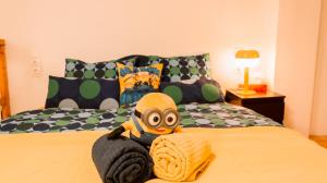 Posteľ alebo postele v izbe v ubytovaní Minion & Snoopy Apartman
