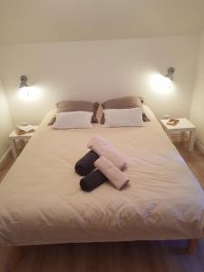 Posteľ alebo postele v izbe v ubytovaní Gîte le Charmot, au pied des montagnes classé 3*