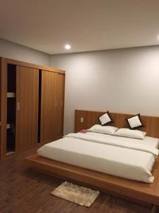 Postel nebo postele na pokoji v ubytování P&T Family Resort