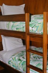 a pair of bunk beds in a room at Lakeside Cottage with Jetty at Lake Tarawera in Rotorua