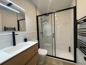 a bathroom with a shower and a sink and a toilet at manresa universidad in Manresa