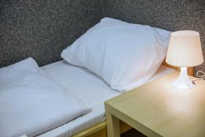 Postel nebo postele na pokoji v ubytování Hostel Seven