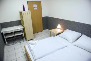Postel nebo postele na pokoji v ubytování Hostel Seven