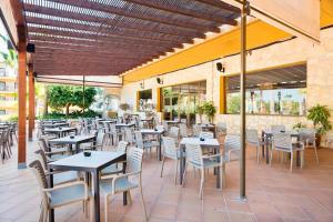 Reštaurácia alebo iné gastronomické zariadenie v ubytovaní Apartamentos Best Alcazar