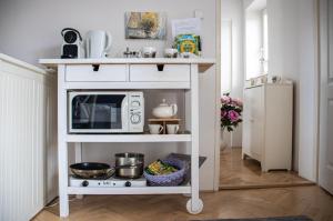 Kuchyňa alebo kuchynka v ubytovaní Apartmány u Petry