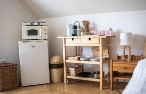 Kuchyňa alebo kuchynka v ubytovaní Apartmány u Petry