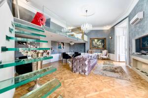 a living room with glass shelves at TOP Luxury Suites in Budapest