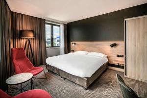 Łóżko lub łóżka w pokoju w obiekcie Park Inn by Radisson Krakow