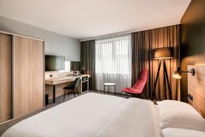 Łóżko lub łóżka w pokoju w obiekcie Park Inn by Radisson Krakow
