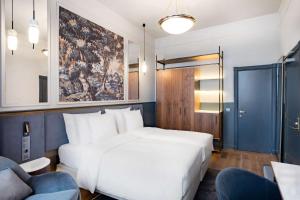 Voodi või voodid majutusasutuse Radisson Collection Astorija Hotel, Vilnius toas