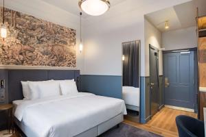Voodi või voodid majutusasutuse Radisson Collection Astorija Hotel, Vilnius toas