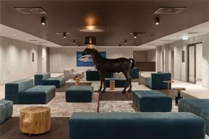 a statue of a horse in a waiting room at Radisson Blu Resort & Conference Center, Ostróda Mazury in Ostróda
