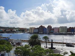 a city with a body of water and buildings at Brion City Hotel BW Signature Collection in Willemstad