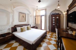 Hotel Pearl Palace Jaipur房間的床