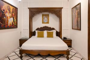 Hotel Pearl Palace Jaipur房間的床