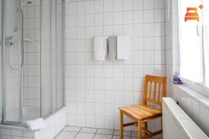 Koupelna v ubytování Pension Zum Hexenstieg + 29 fotografií