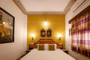 Hotel Pearl Palace Jaipur房間的床
