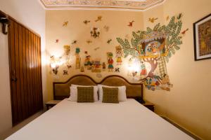 Hotel Pearl Palace Jaipur房間的床