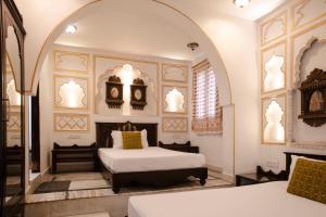 Hotel Pearl Palace Jaipur房間的床