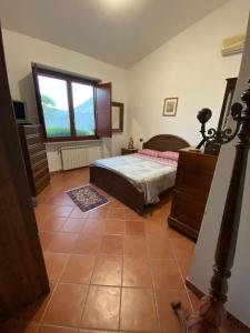 Postel nebo postele na pokoji v ubytování Villa Rotondo
