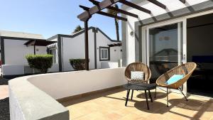 Ein Balkon oder eine Terrasse in der Unterkunft Caleta Dorada
