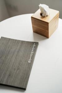 a wooden box sitting on top of a table at Macdonald's Farm in Saint Ervan