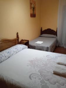 A bed or beds in a room at Apartamento Cerro De Las Salinas Még 12 kép