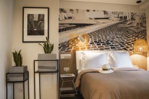 A bed or beds in a room at room Select Liberdade