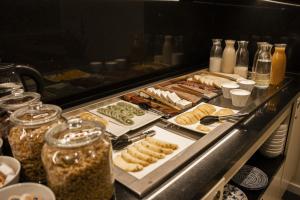 a buffet line with different types of food at Select Liberdade in Lisbon