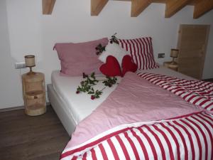 Postel nebo postele na pokoji v ubytování Apartments Resi