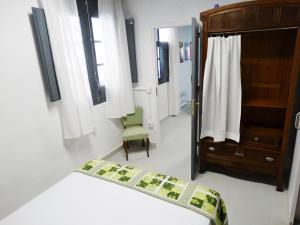 Giường trong phòng chung tại Can Barraca Loft Figueres