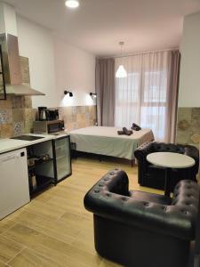 Postel nebo postele na pokoji v ubytování РUEВLO МAR, hotel-apartamento