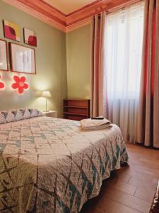 A bed or beds in a room at Casa de Huespedes Dolce Vita