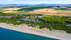 an aerial view of an island in the water at Gitavillage California in Montalto di Castro