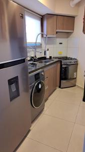 Kuchyň nebo kuchyňský kout v ubytování ESPACIO C CRISOL Plaza España