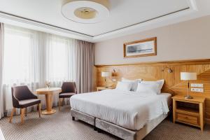 Hotel Haffner Resort & Spa - Destigo Hotels客房内的一张或多张床位