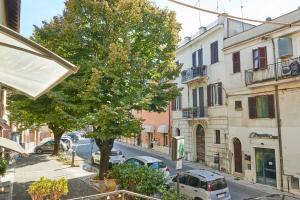 a view of a street with cars parked on the street at Jerry & Titty house in Capena